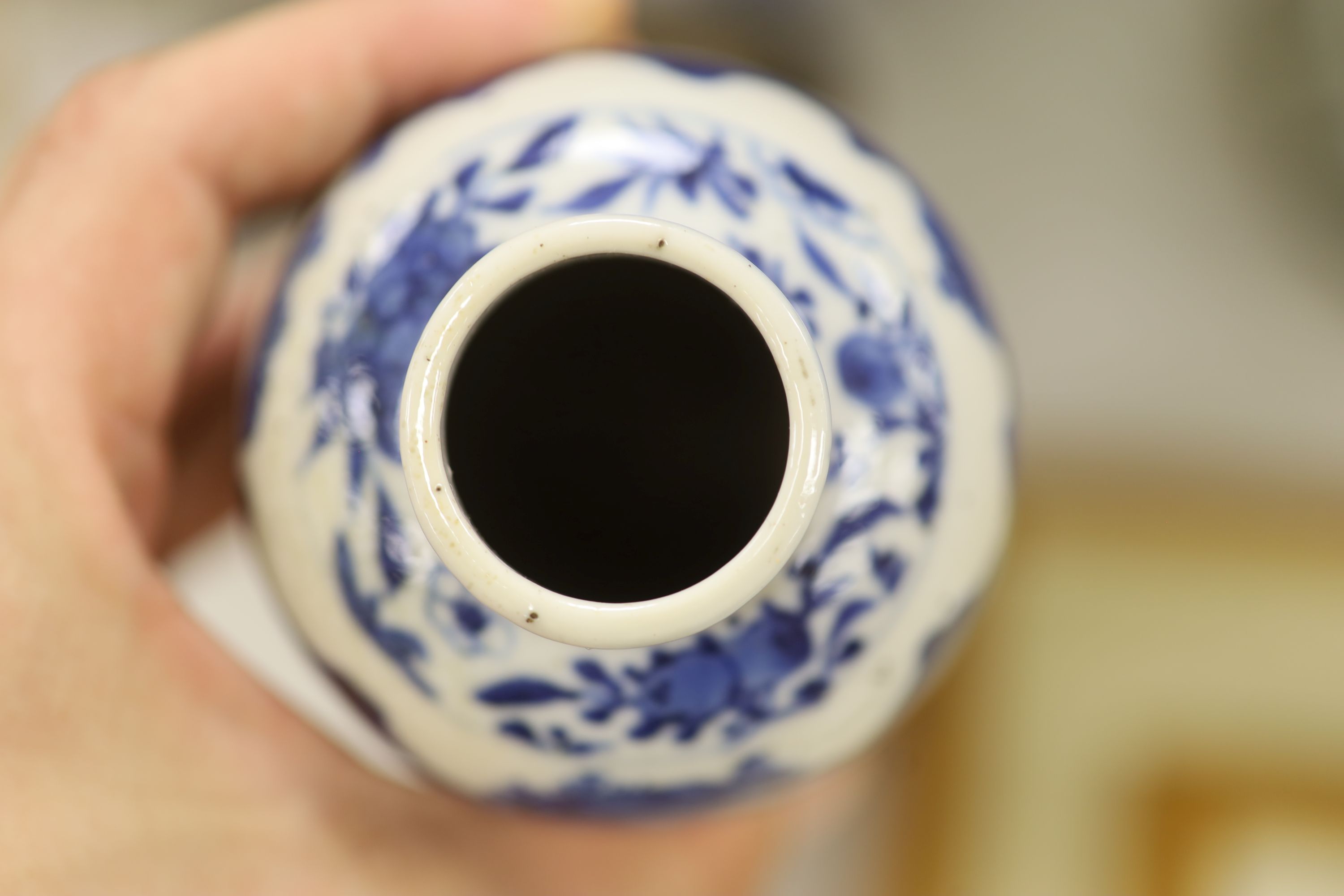 Three Chinese blue and white vases, a cloisonne enamel vase, another vase and a soapstone figure